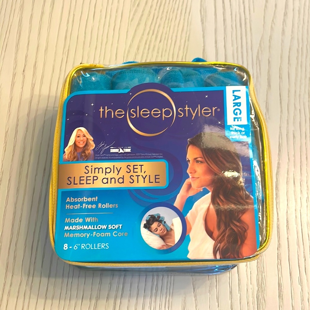 The sleep styler hair curler , boxed and unused.